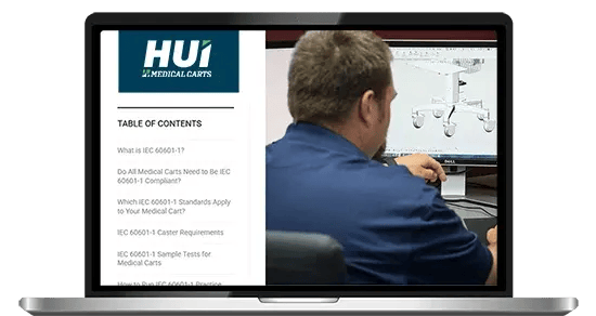 Ultimate-guide-to-IEC-60601-1-guide-on-laptop-opt-550px